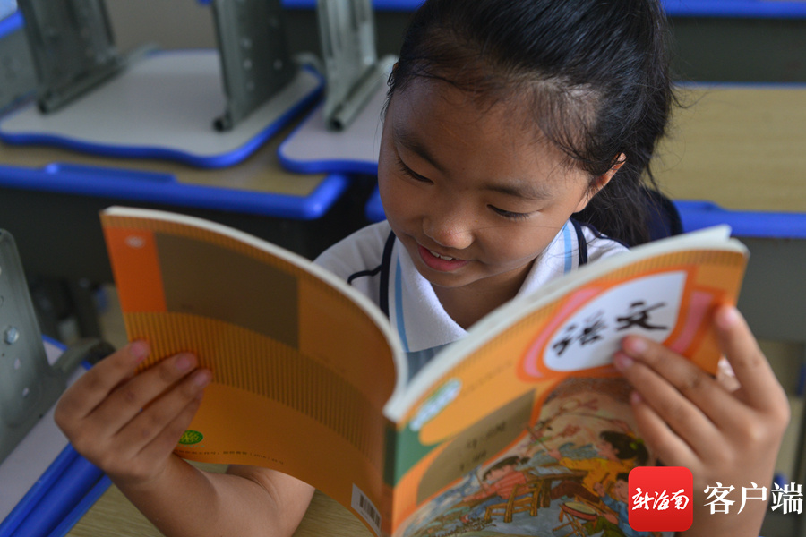 原创组图|领新书,迎开学!海口小学生回校报到欢乐多