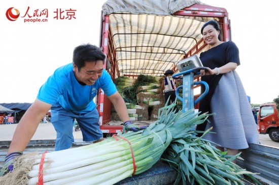 跟着看中国｜新发地：托稳首都“菜篮子” 打造新消费活力之地欧亿体育 欧亿体育app下载(图2)