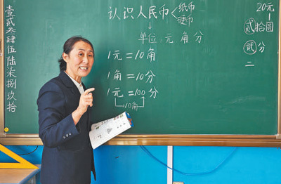 吉林（Dunhua）的一位老师朱·古