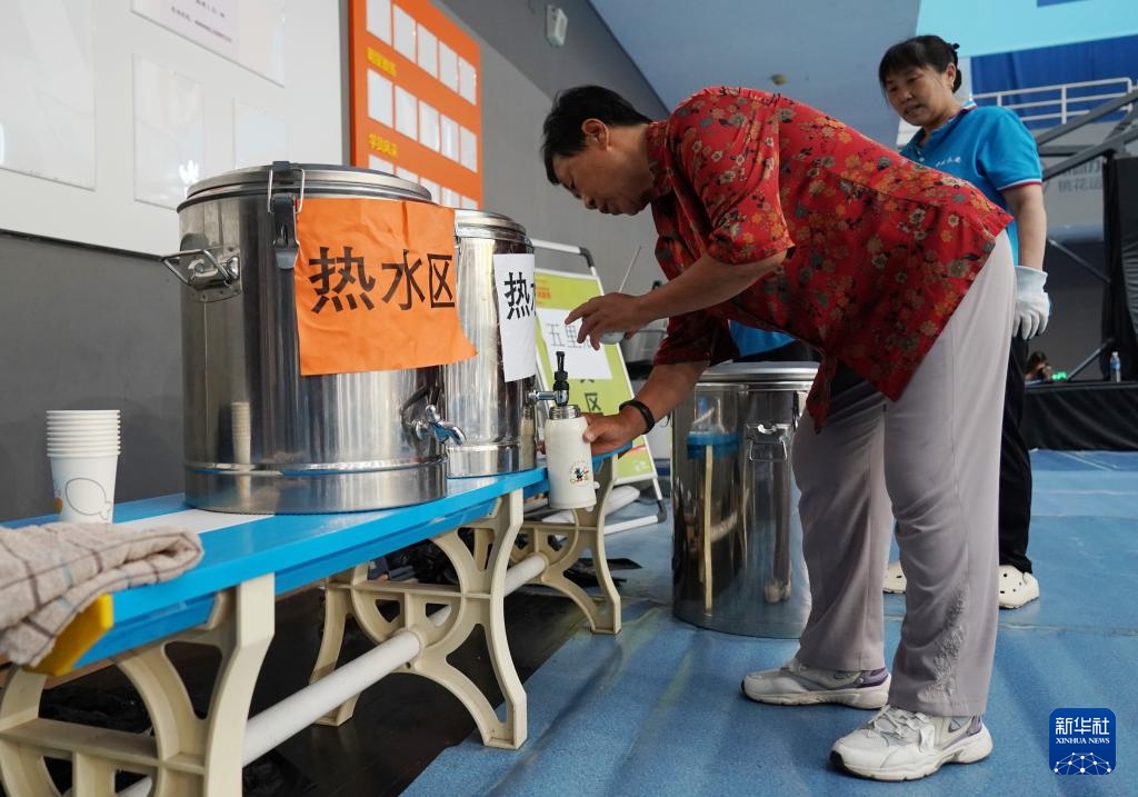 访问北京Pinggu区体育中心的重新安置现场