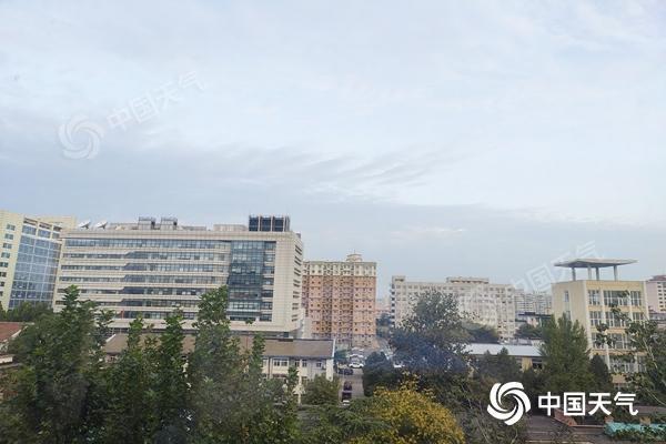 今天，北京欢迎明天的短热，雨水和寒冷来临