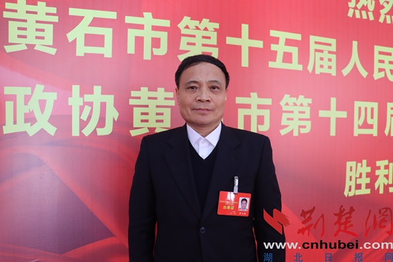 3.罗日新  市政协委员，湖北天新置业有限公司董事长、中国作家协会会员.JPG