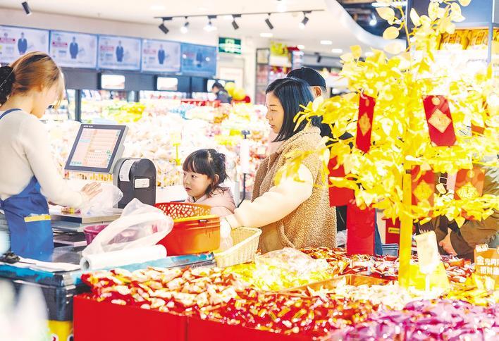 热气腾腾迎马年 年货市场供销旺