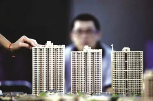 武汉等14个热点城市房价迅速降温,房产税权威