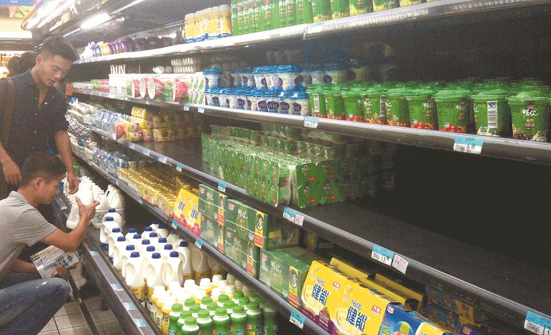 高价奶扎堆做促销 超市液态奶吆喝声不同 -荆楚