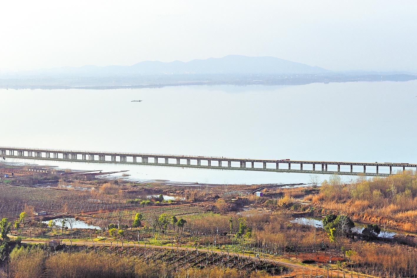 桃色香居下载之武阳高速梧桐湖大桥钢栈桥贯通
