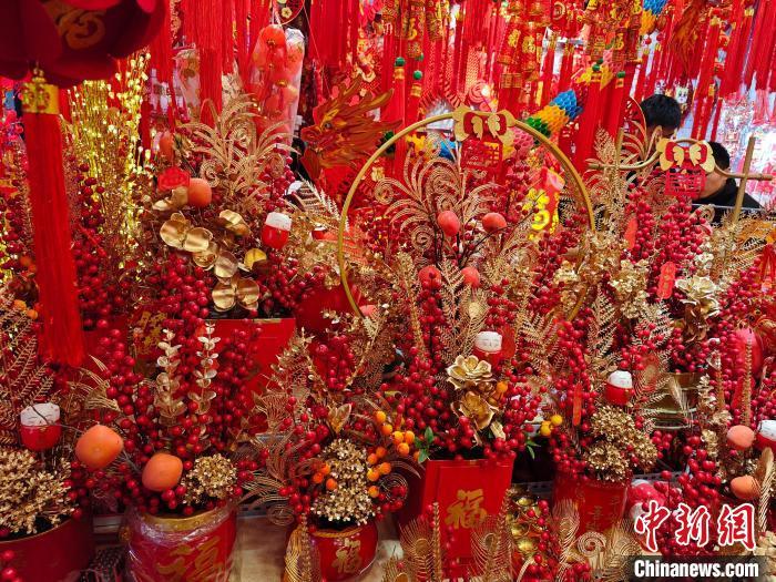 新春见闻重庆年味渐浓一派年货采购繁忙景象